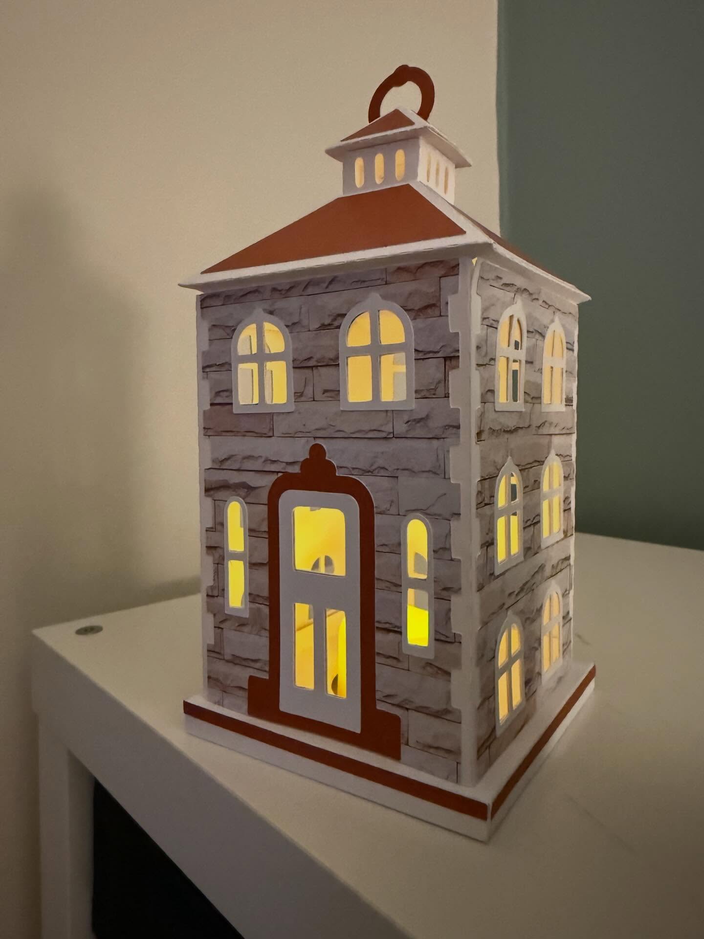 Illuminated paper house lantern
